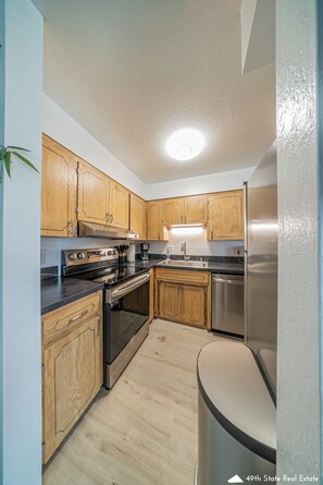 Fridge, cookware/dishes/utensils, paper towels - Your Nordic Retreat (Anchorage)