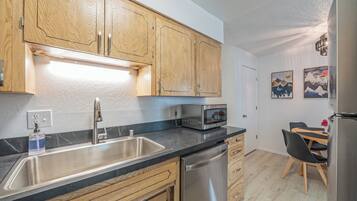 Fridge, cookware/dishes/utensils, paper towels