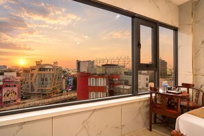 Suite, City View | Blackout curtains, soundproofing, free WiFi, bed sheets - Red Sun Airport Saigon Hotel (Ho Chi Minh City)