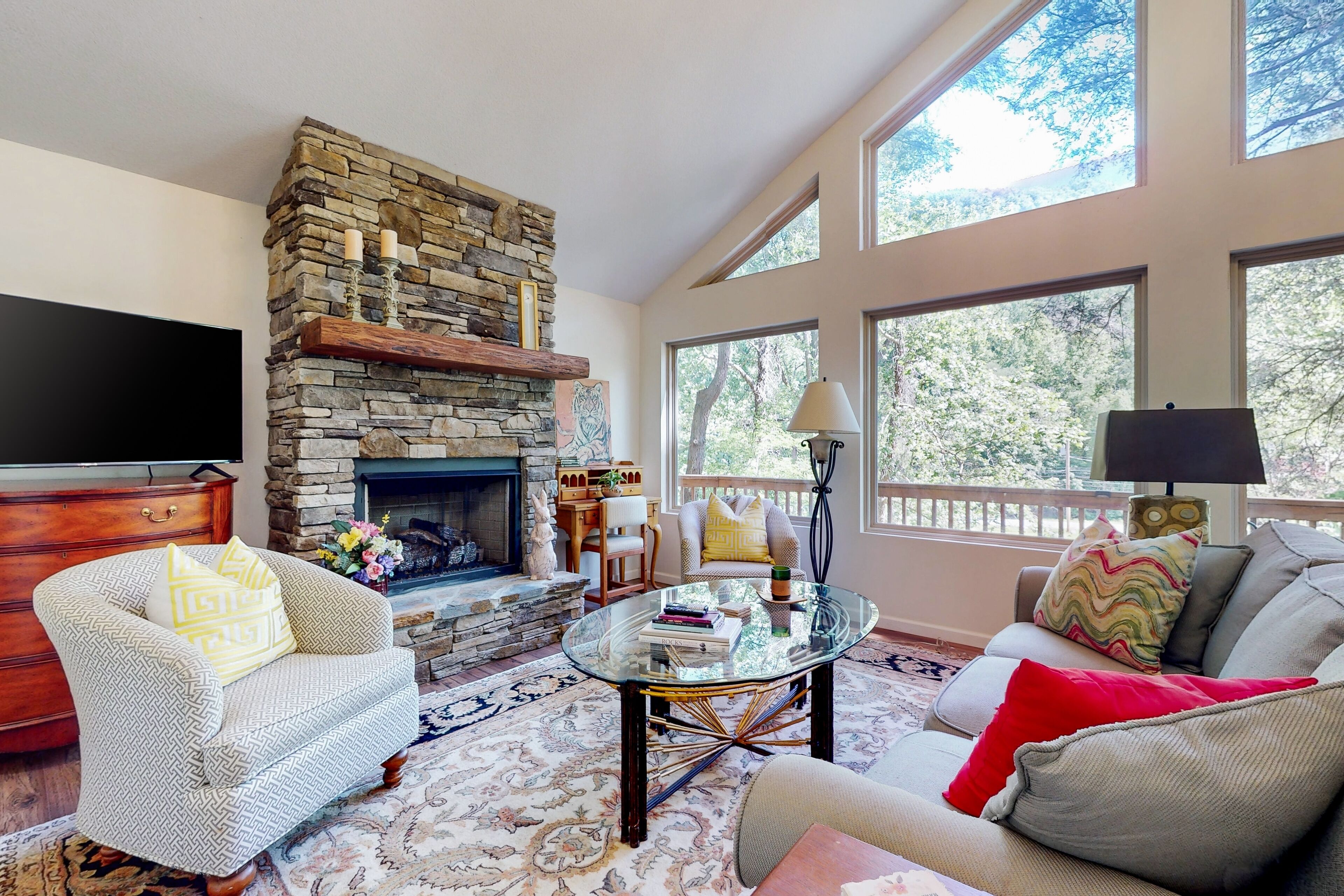 Riverfront home with 228 ft of riverfront access & wraparound deck with views