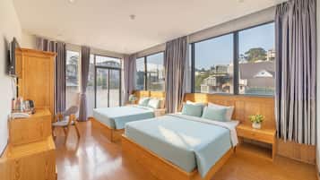 Deluxe Twin Room, City View | Minibar, desk, laptop workspace, soundproofing