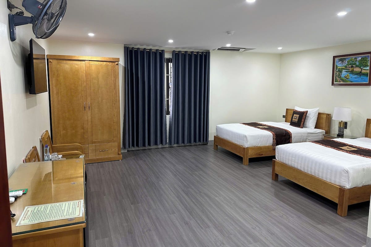 Double or Twin Room | Desk, laptop workspace, blackout drapes, free WiFi