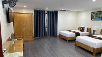 Twin Room | Minibar, blackout drapes, free WiFi, bed sheets