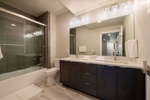 Shower, hair dryer, shampoo
