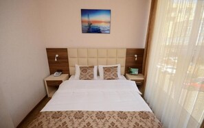 In-room safe, desk, laptop workspace, blackout drapes - Hotel City (Batumi)
