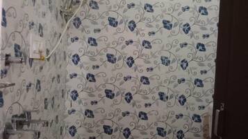 Shower, rainfall showerhead, towels, soap