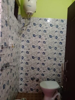 Shower, rainfall showerhead, towels, soap
