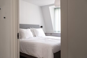 2 slaapkamers, een strijkplank/strijkijzer, reisbedje, wifi