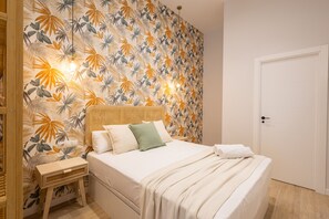 Tabla de planchar con plancha, wifi gratis y ropa de cama 