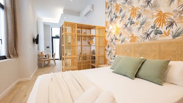 Een strijkplank/strijkijzer, gratis wifi, beddengoed