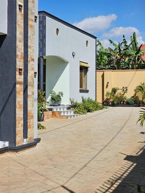 Deluxe Apartment, 1 Bedroom | Terrace/patio - The Residence Ug (Kampala)