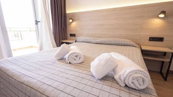 Standard Apartment, Partial Sea View | 2 bedrooms, in-room safe, iron/ironing board, free WiFi