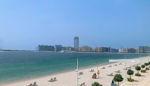 Private beach, white sand, beach bar - Ultimate One Bedroom with Private Beach Access (Dubai)