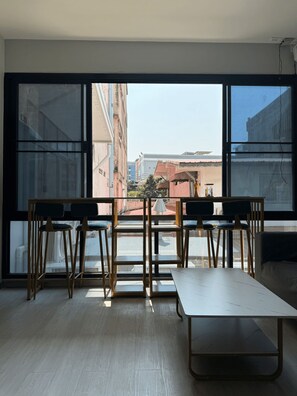 Living area - First Villa Life Hostel  (Bangkok)