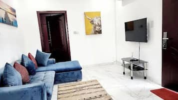 Apartment | Living area | 45-inch plasma TV with cable channels, Netflix, streaming services