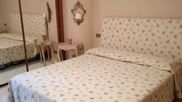 3 slaapkamers, een strijkplank/strijkijzer, beddengoed
