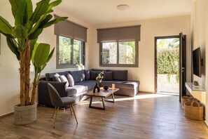 Grand Suite | Living area | 32-inch Smart TV with digital channels - Sun City Luxury Apartments (Rhodes)