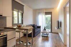 Superior Suite | Living area | 32-inch Smart TV with digital channels - Sun City Luxury Apartments (Rhodes)