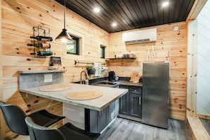 Fridge, microwave, coffee/tea maker, toaster