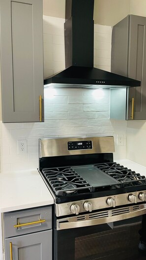 Fridge, coffee/tea maker, toaster, cookware/dishes/utensils