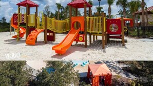 A playground with multiple slides and climbing structures, surrounded by palm trees and a sandy ground. - This townhouse is a 5 bedroom(s), 4.5 bathrooms, located in Davenport, FL. (Davenport)