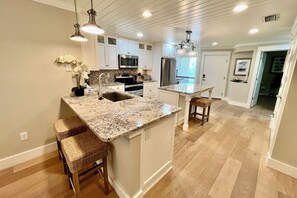 Fridge, microwave, oven, kitchen islands