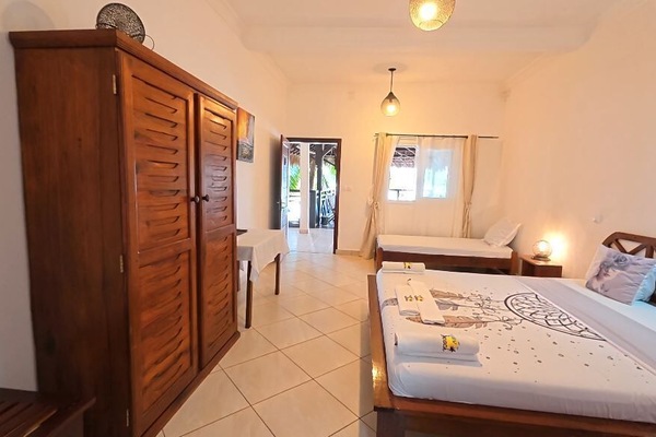 Comfort Triple Room, Partial Sea View | In-room safe, laptop workspace, blackout drapes, WiFi (free)