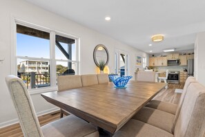 Dining - Enjoy stunning ocean views at Chipps Ahoy, a spacious 4-bedroom retreat in Oak Island. (Oak Island)