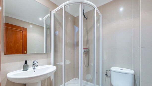 A modern bathroom with a glass-enclosed shower, a white sink, and a toilet. - Fantastic 4 bed apt La Cala Hills (Mijas Costa)