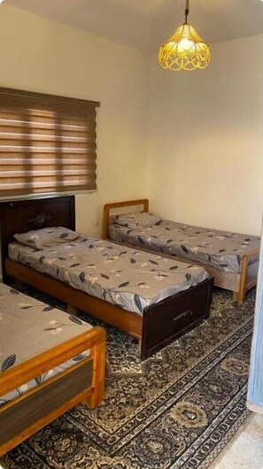 Classic Quadruple Room, Patio | Desk, laptop workspace, free WiFi