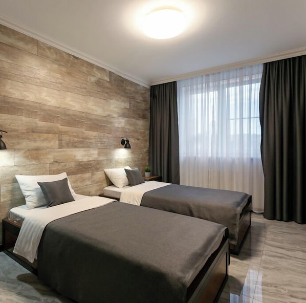 Habitación básica con 2 camas individuales | Caja fuerte, sistema de insonorización, tabla de planchar con plancha