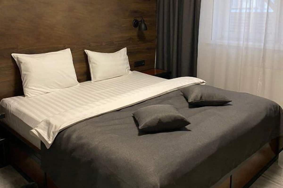 Economy-Doppelzimmer | Zimmersafe, schallisolierte Zimmer, Bügeleisen/Bügelbrett