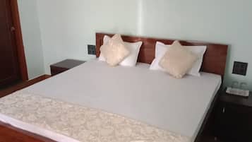 Standard Room, Garden View | 4 bedrooms, in-room safe, individually furnished, desk