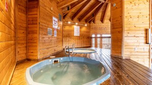 A wooden cabin with a hot tub and a sauna. - Streamside! Ski In/Out & Hiking (Breckenridge)