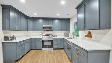 Cottage, 5 Bedrooms | Private kitchen | Fridge, oven, coffee/tea maker