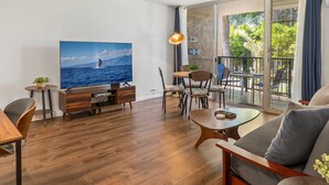 Kondominium, 1 kamar tidur | Area keluarga | Smart TV