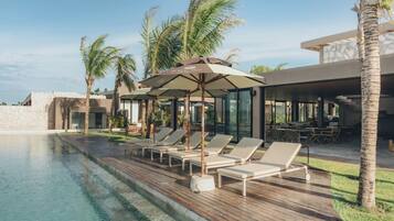 Outdoor pool, open 8:00 AM to 10:00 PM, pool loungers