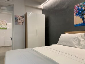 1 bedroom, desk, iron/ironing board, travel cot