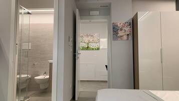 Shower, eco-friendly toiletries, hair dryer, bidet