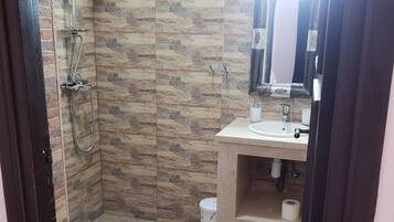 Shower, bidet, towels, soap