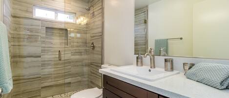 Hair dryer, towels, soap, shampoo