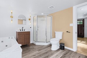 Jetted tub, hair dryer, towels, soap