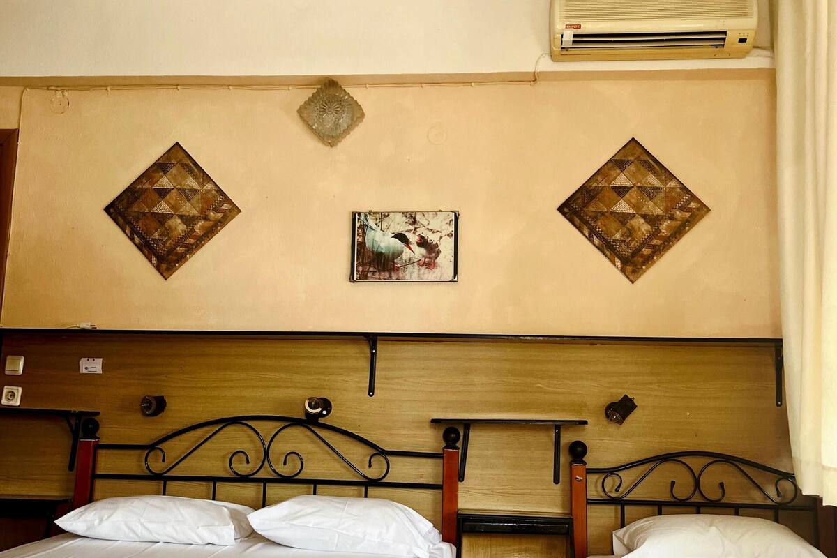 Classic Triple Room, Balcony, Sea View | Desk, laptop workspace, WiFi (free), bed sheets