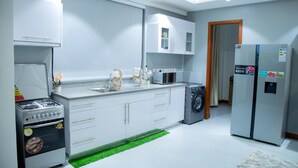 Apartment | Private kitchen | Fridge, microwave, oven, stovetop - Luxury Cozy Kampala Apartment With 2 Bedrooms (Kampala)