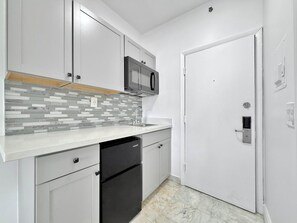 Microwave, stovetop, coffee/tea maker, toaster