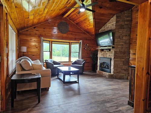 Our cozy cabin has a spacious yard. Great for families!