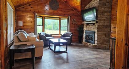 Our cozy cabin has a spacious yard. Great for families!