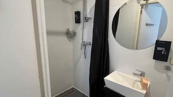 Shower, towels, soap, shampoo
