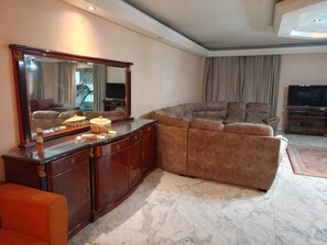 Living area - شقة فندقية ثلاث غرف المهندسين فيو نادي الصيد ارقي اماكن المهندسين  (Giza Governorate)