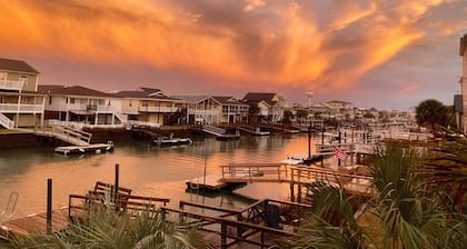 JUST REDUCED! Perfect for fishing and families! Close to ICW- Canal front home!